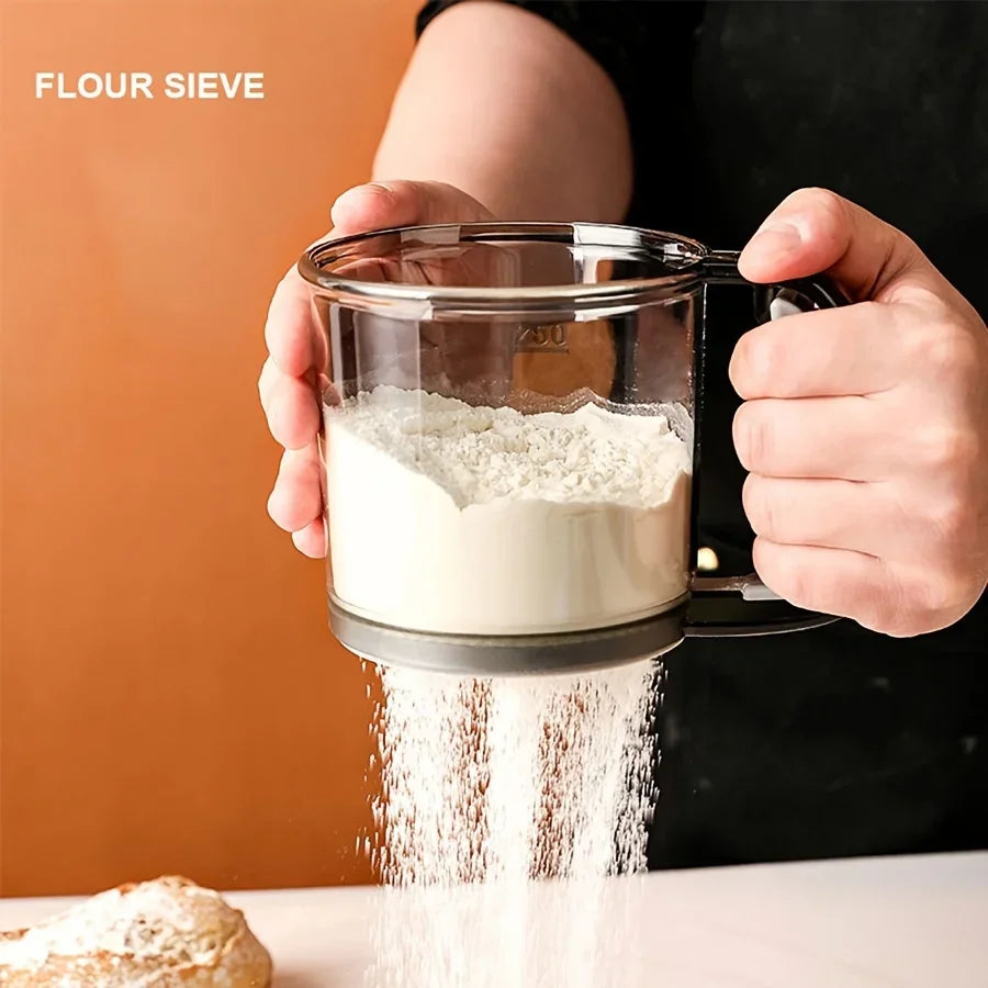 Semi-Automatic Flour Sifter – Hand Press Transparent Sieve, Non-Stick Baking Tool for Easy & Mess-Free Kitchen Use.