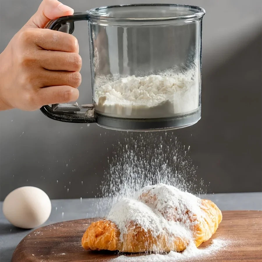 Semi-Automatic Flour Sifter – Hand Press Transparent Sieve, Non-Stick Baking Tool for Easy & Mess-Free Kitchen Use.