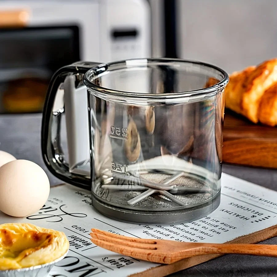 Semi-Automatic Flour Sifter – Hand Press Transparent Sieve, Non-Stick Baking Tool for Easy & Mess-Free Kitchen Use.