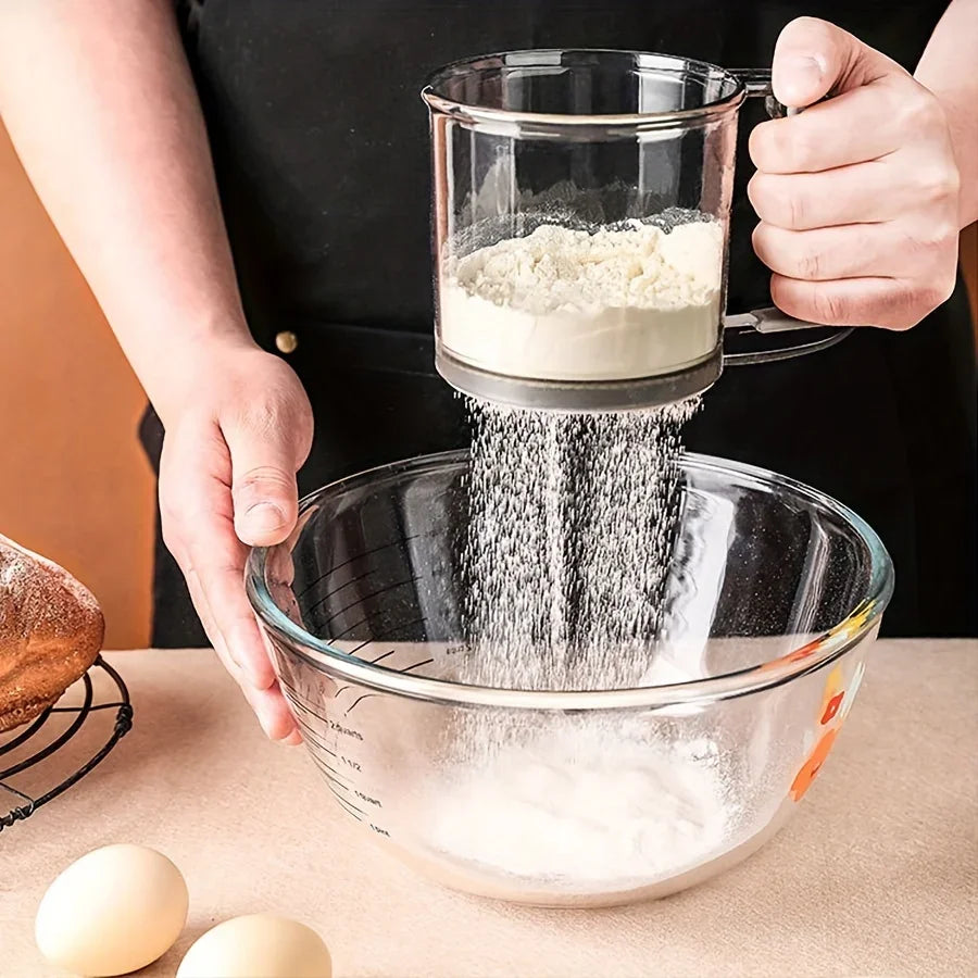 Semi-Automatic Flour Sifter – Hand Press Transparent Sieve, Non-Stick Baking Tool for Easy & Mess-Free Kitchen Use.